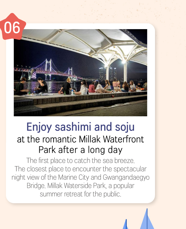 Enjoy sashimi and soju at the romantic Millak Waterfront Park after a long day